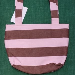 Pink purse with brown stripes.